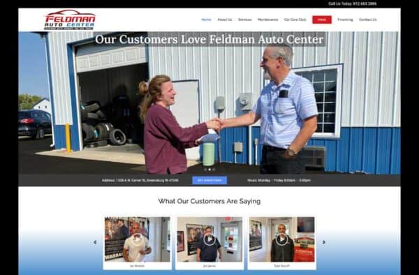 Two people smile and shake hands outside an auto center garage, with tires and equipment visible inside. Featured in our website portfolio, the heading reads: Our Customers Love Feldman Auto Center.
