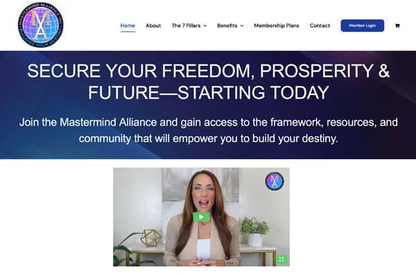 Screenshot of a website portfolio showcasing the Mastermind Alliance program, with a logo, navigation menu, headline Secure Your Freedom, Prosperity & Future—Starting Today, and a video of a woman speaking beneath the main text.